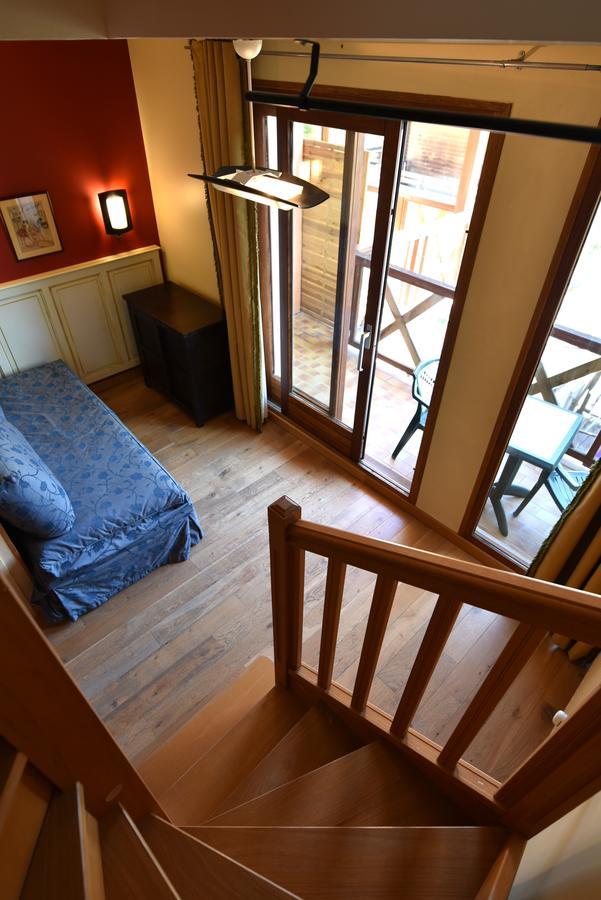Les Lodges Du Lac Saint-Alban-de-Montbel Quarto foto